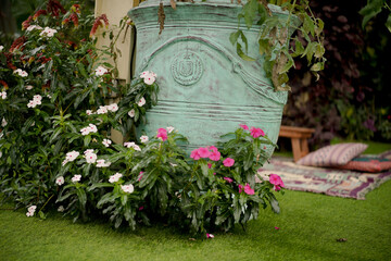 colorful flower garden with decorative pots
