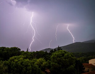 Dramatic lightning storm over hills