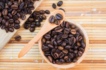 coffee beans on a bamboo mat background