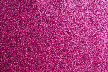 A pink background with a lot of small dots
