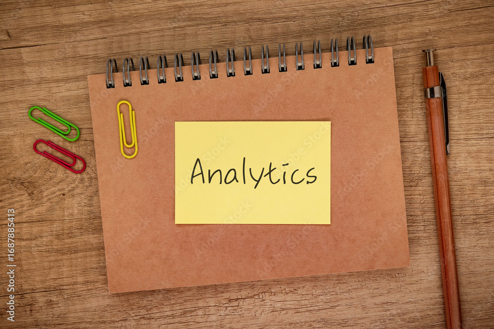 Poster there is sticky note with the word analytics. it is as an eye-catching image.