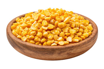 Dried yellow split peas in wooden bowl