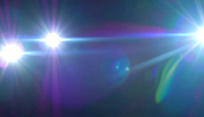 Fototapeta premium Abstract light flares on dark background