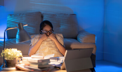 Women working from home at night