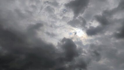 Fototapeta premium Sun breaking through dark clouds