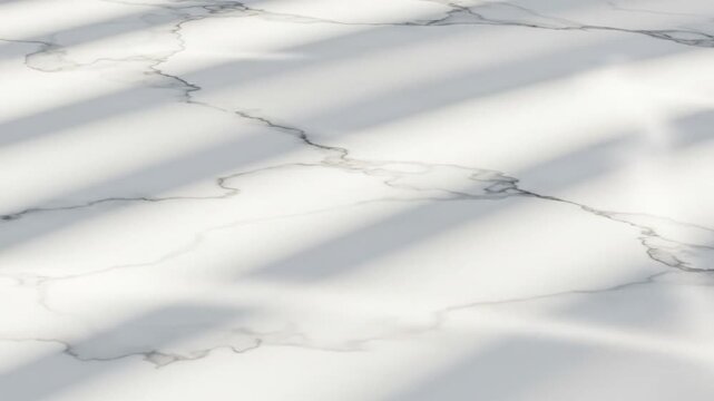 White surface with grey marble pattern overlaid with parallel shadows