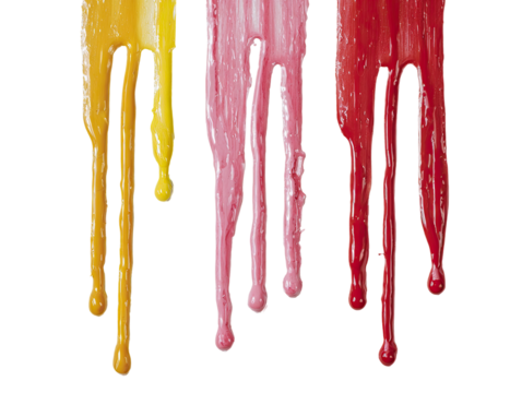 Three dripping streams of colored liquid, likely candy or paint, cascading downwards