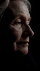 Close, photorealistic portrait of an older woman showing natural skin texture, realistic wrinkles, and detailed hair strands. Calm, dignified expression with accurate facial anatomy