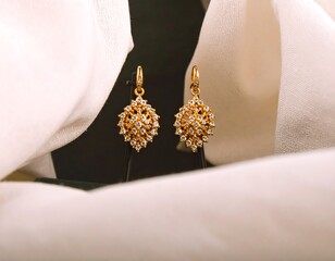 Elegant gold earrings with diamond accents
