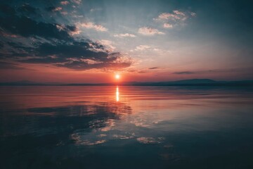 Sunset over a still lake, vibrant colors