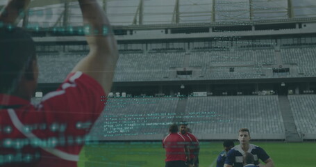 Group of rugby players practicing on grass at empty stadium, holding ball with code overlay