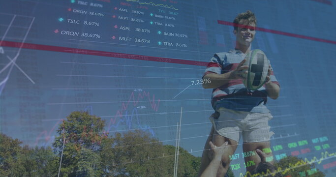 Leaping rugby player in striped jersey catching ball on pitch, with stock charts, copy space - Powered by Adobe