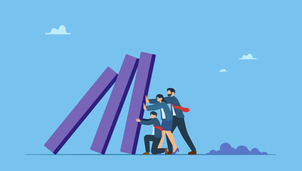 Obraz premium Business people colleagues help stop domino falling. Teamwork to solve problem, team effort help stop crisis, responsibility to stop failure, support or trustworthy or courage to success.