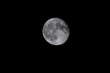 full moon over black