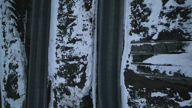 Los Caracoles highway road near Santiago Chile in aerial view. Road at Andes Mountains. Snowing scenery. Snow highway road. Winding curves near Argentina and Chile border