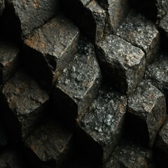 Dark volcanic rock surface with natural weathering patterns and mineral deposits creating dramatic geological texture background