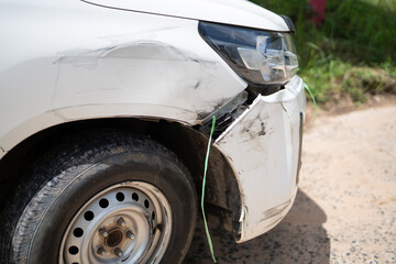 Close-up wrecked car after road accident symbolizing reckless driving, insurance risk, and...