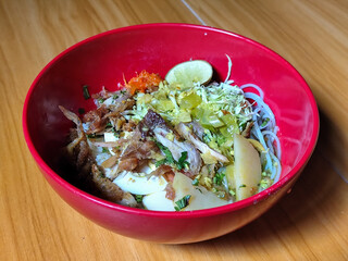 Soto Ayam in Indonesia. Soto ayam is a traditional Indonesian dish that uses ingredients such as...