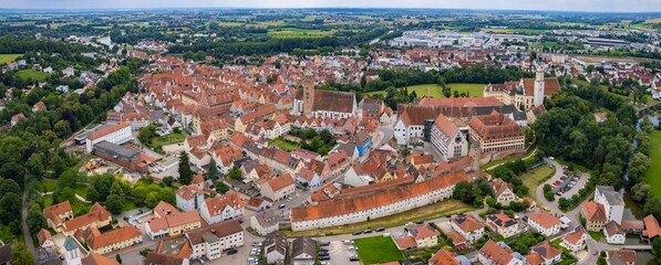 An aerial panorama view above the old town of the city Donauworth on a sunny summer day in Bavaria, Germany