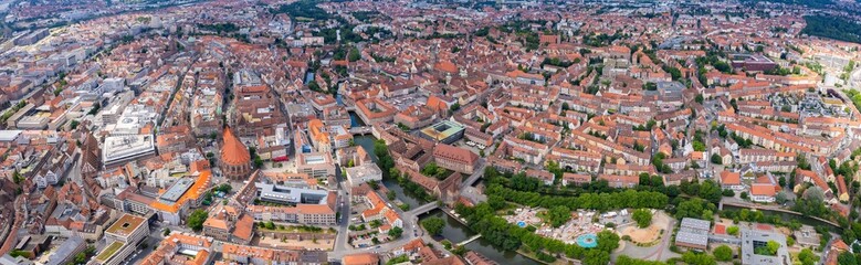 Obraz premium An aerial panorama view above the old town in the city Nuremberg or Nürmberg during an overcast summer day in Bavaria, Germany