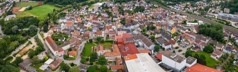 An aerial panorama view above the downtown in the city Treuchtlingen during a sunny summer day in Bavaria, Germany