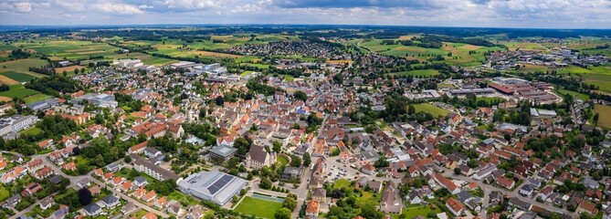 An aerial panorama view above the downtown in the city Wertingen during a sunny summer day in Bavaria, Germany