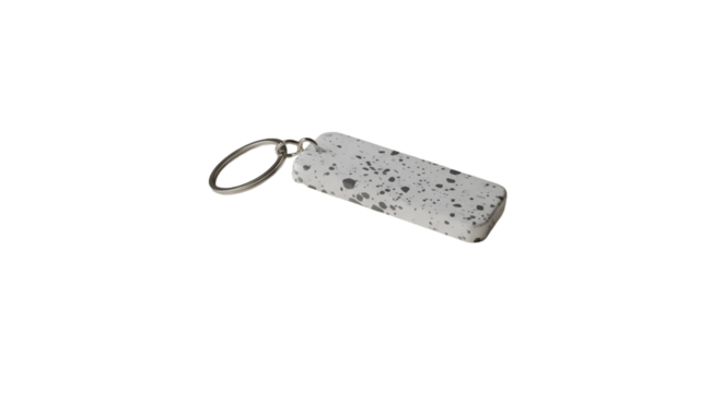 A modern speckle keychain with a sense of minimalist style for your everyday carry with a silver key ring and black