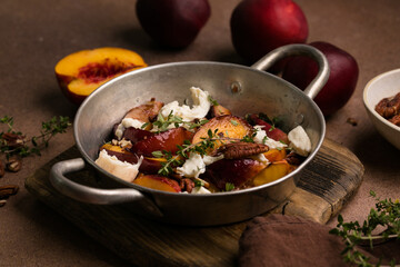 Salad with Caramelized Peaches, Burrata, Pecans, Thyme, and Honey