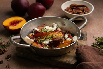 Salad with Caramelized Peaches, Burrata, Pecans, Thyme, and Honey