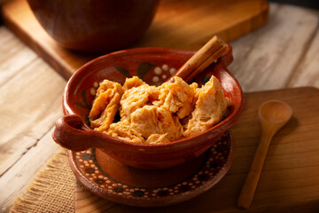 Chongos Zamoranos. A Mexican dessert made from curdled milk prepared with syrup and cinnamon, it has a consistency similar to that of a soft, sweet cheese. They are homemade and also available canned.