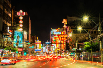 CHINATOWN, BANGKOK, THAILAND - October 26, 2025 : View on people and traffic pass by in Chinatown...