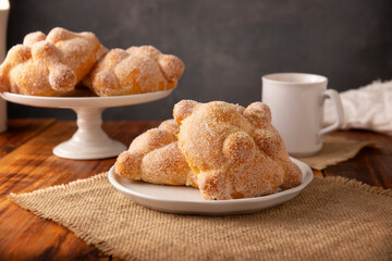 Pan de Muerto. Traditional Mexican sweet bread that is consumed in the season of the day of the...