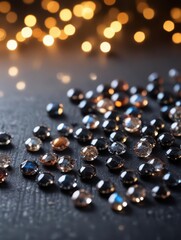 Glittering black rhinestones scattered on a dark canvas with a bokeh background