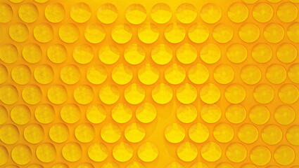 Bright Yellow Bubble Wrap Texture with Repeating Circles for Packaging and Protection