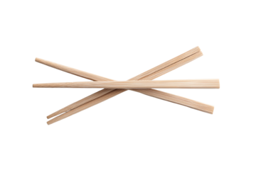 Set of wooden chopsticks arranged on a white background.
