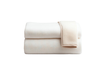 Fototapeta premium Soft white blanket rolled elegantly for a cozy and inviting atmosphere.