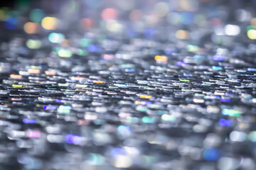 Obraz premium Shiny blurred luxury glitter texture with bokeh background