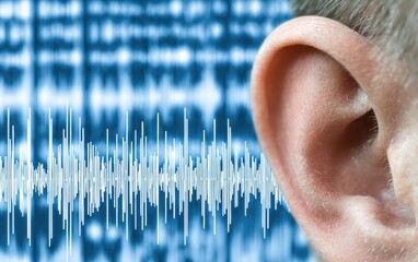 Close-up of an ear with audio waves overlay