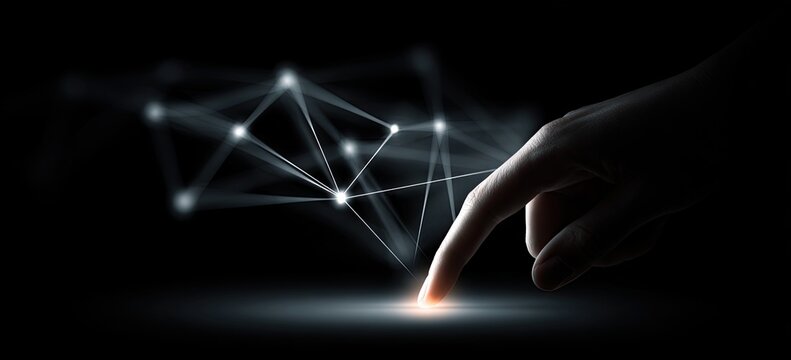 Hand touches glowing network interface
