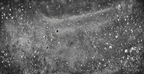 Gray, speckled, textured surface with subtle patterns