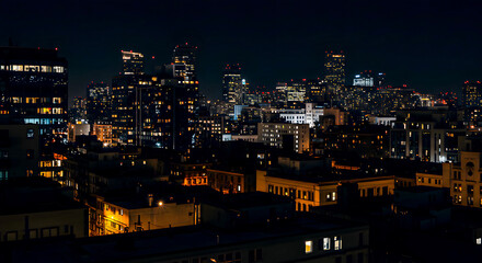 Fototapeta premium Expansive view of a dense urban metropolis at night, with glowing downtown skyscrapers rising above shadowed buildings