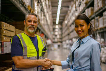 Logistics employee is service customer at warehouse.