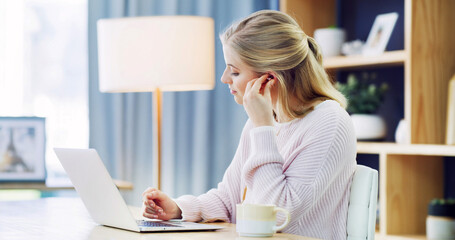 Woman, student and earphones with laptop in home, audio and virtual class for online course. Girl, computer and e learning for education, development and study with college assessment at house