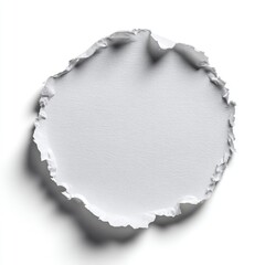 Circular torn paper cutout on white background