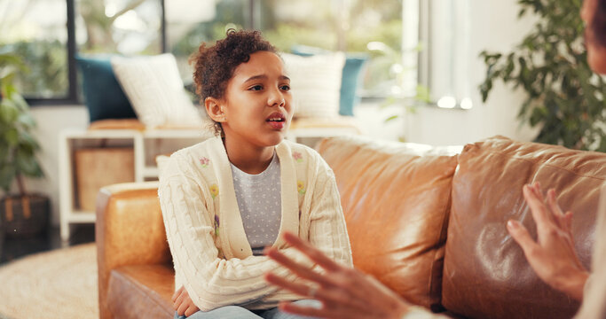 Sad, child and mother scolding at house for explaining rules, discipline and disobedient behavior. Strict, parent and lecture girl on bad attitude, teaching consequences and warning for boundaries