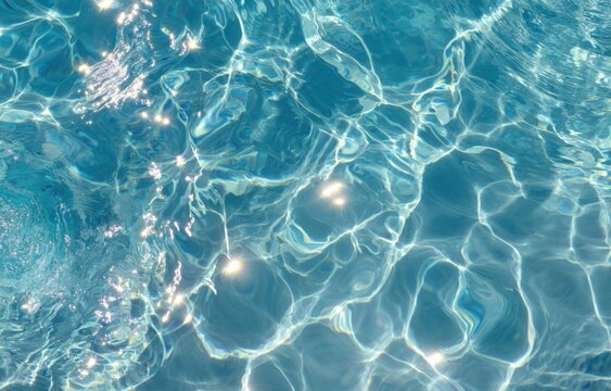 Sparkling pool water surface - Powered by Adobe