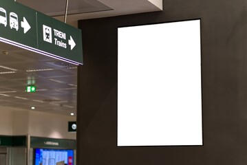 White billboard or large display at the airport.