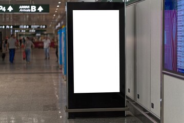 White billboard or large display at the airport.