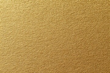 Golden textured surface.  Close-up view of a smooth, gold-colored material