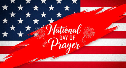A striking image of the american flag with a bold red brushstroke overlaying the text national day of prayer and small fireworks
